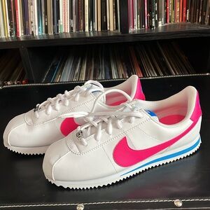 Hot pink and blue Nike Cortez
